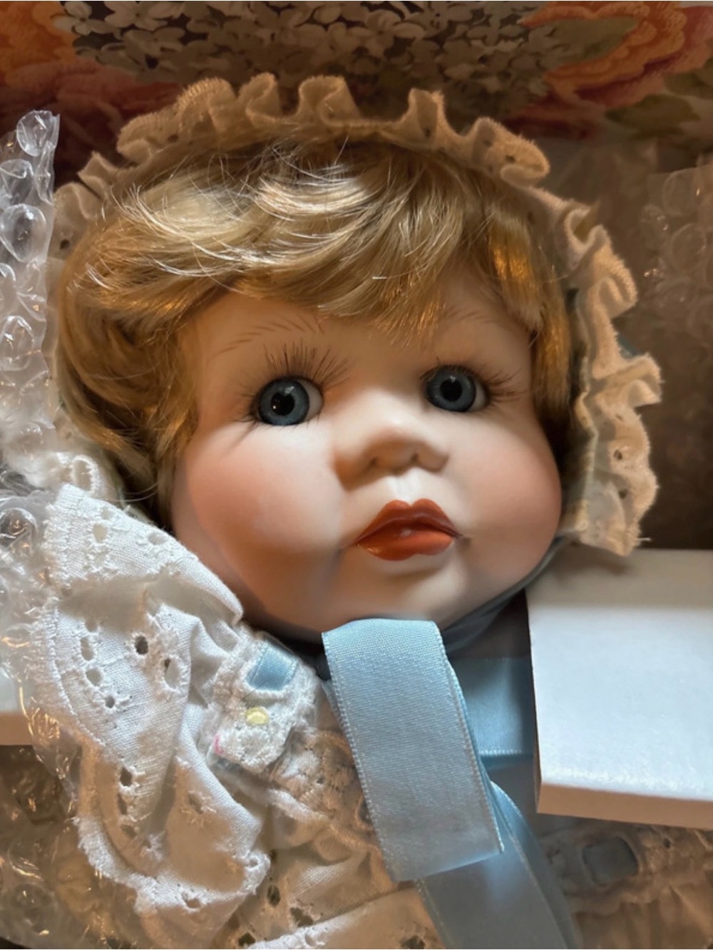 Duck House Encore “Cupcake” Coll Baby Doll with Blue Ribbon and Lace Bonnet